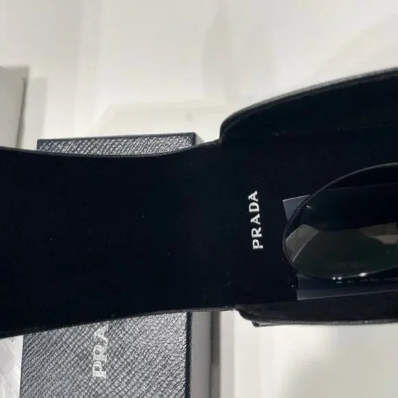 Prada 61mm Oval Sunglasses silver